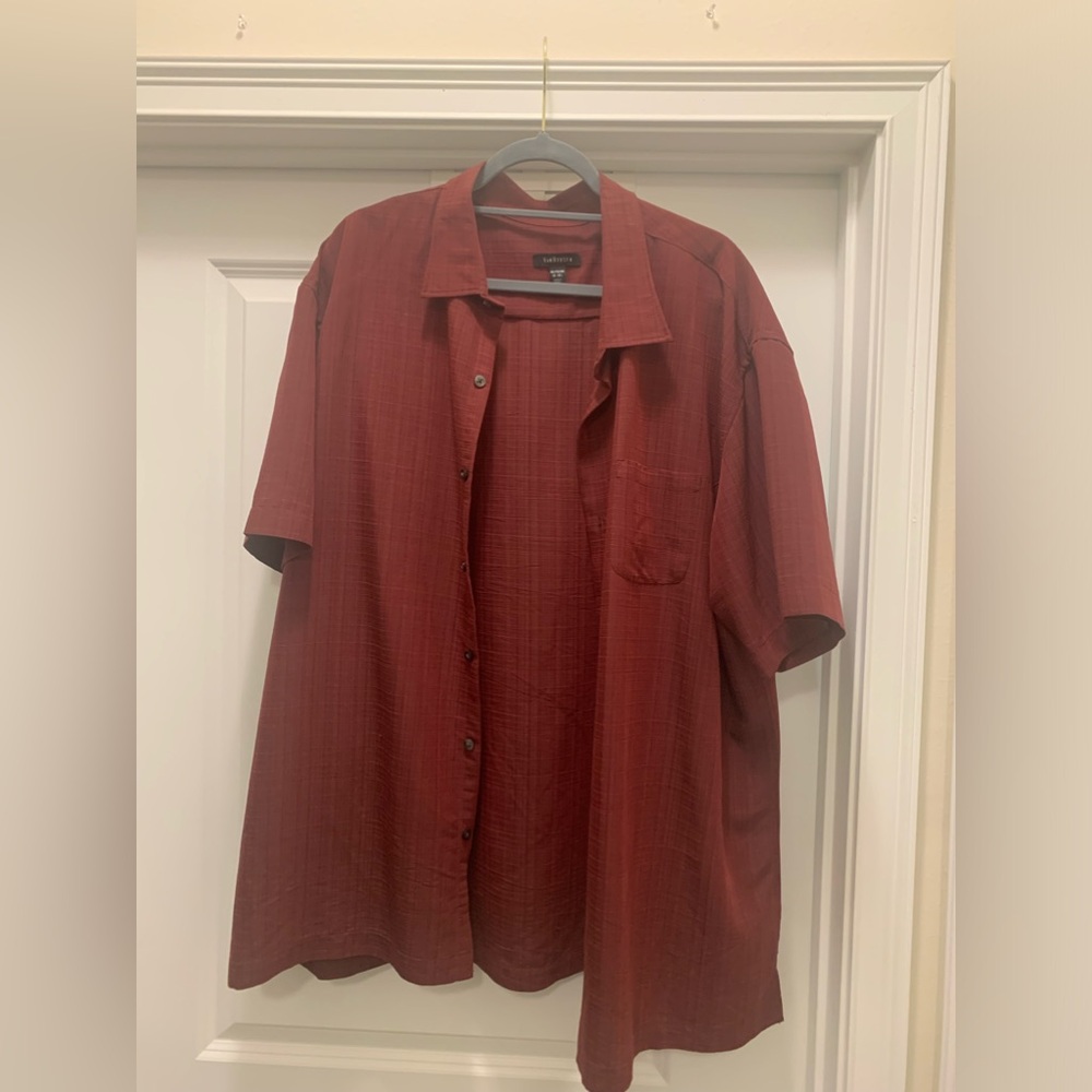 Button down short sleeve shirt more of a dark red or maroon-ish nature of color